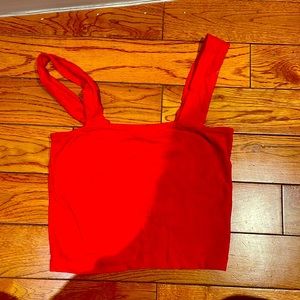 Red Square neck top.